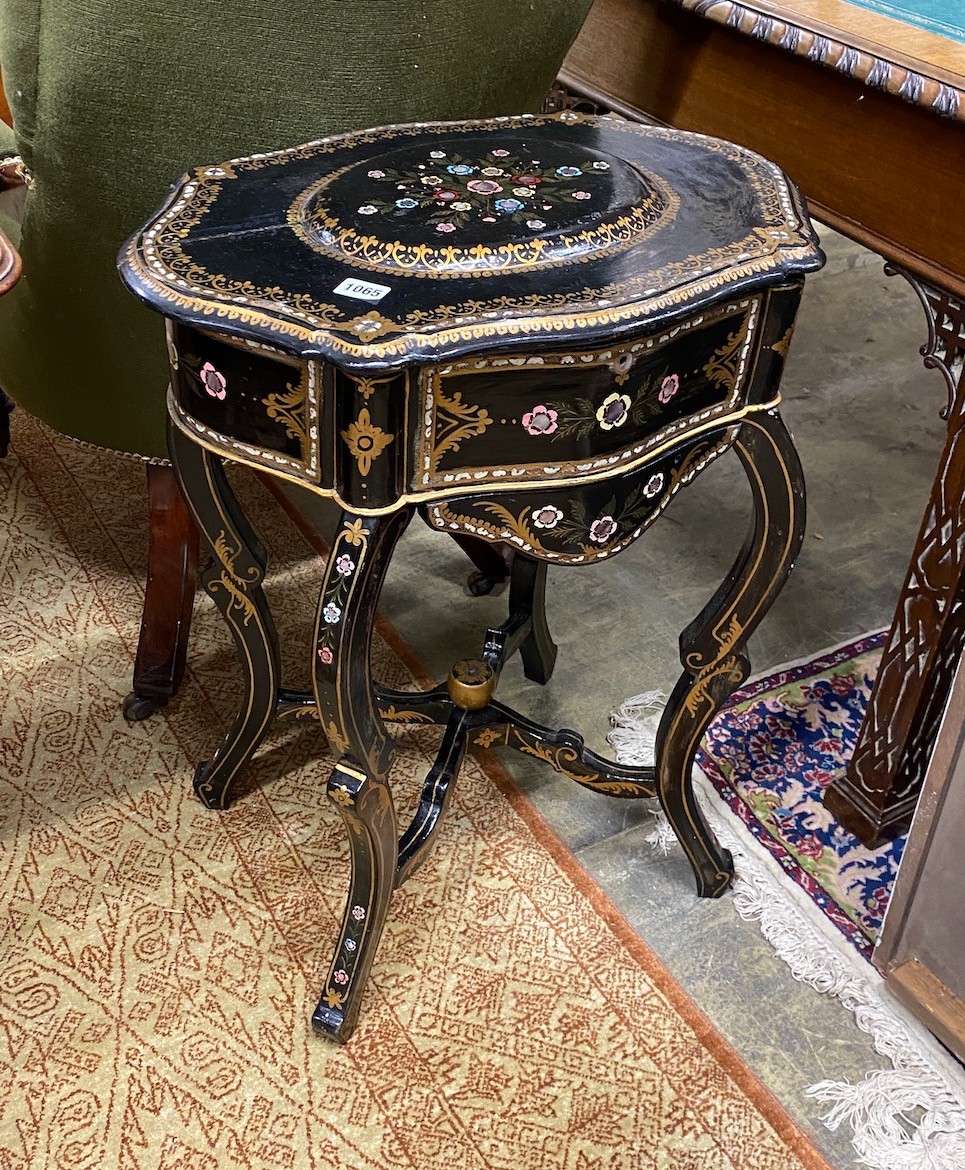 A 19th century French mother of pearl inlaid, parcel gilt ebonized and papier-mâché work table width 53cms, depth 38cms, height 68cms.